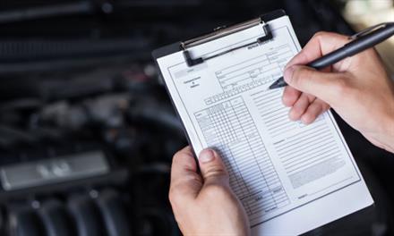 vehicle-maintenance-inspections mechanic with vehicle maintenance list